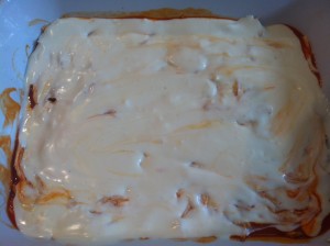 Bleu and cream cheese layer of buffalo chicken dip